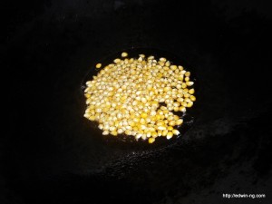 Frying of popcorn seeds. :)